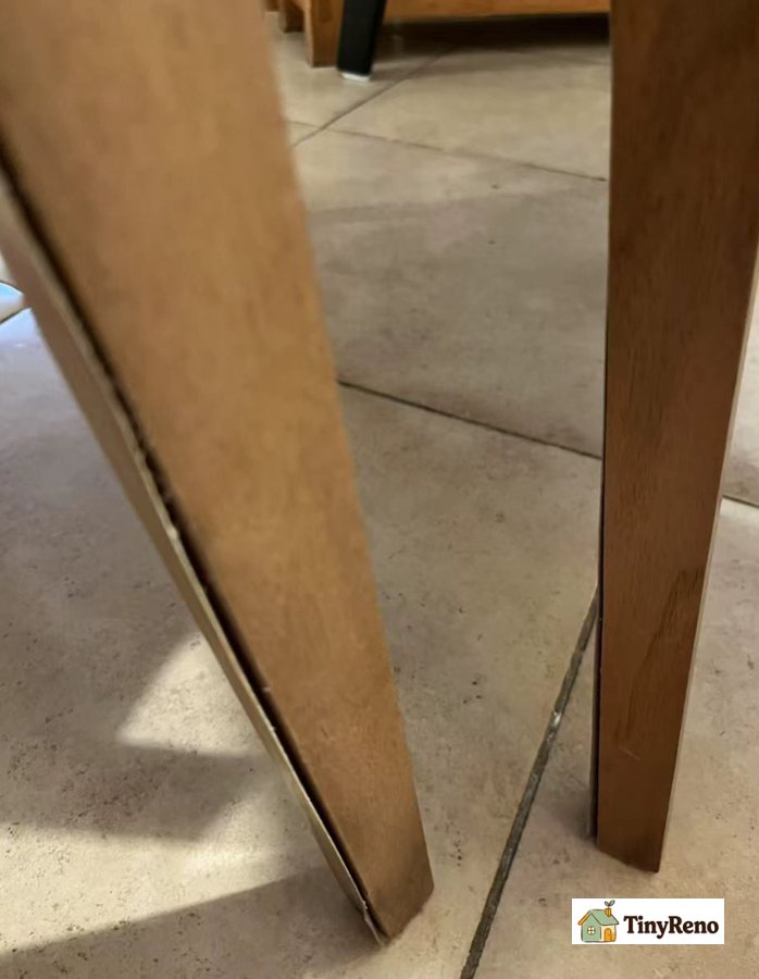 The legs of the stool are cracked and a bit wobbly