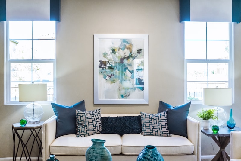 Modern apartment living room with hardwood floor and large window in natural daylight