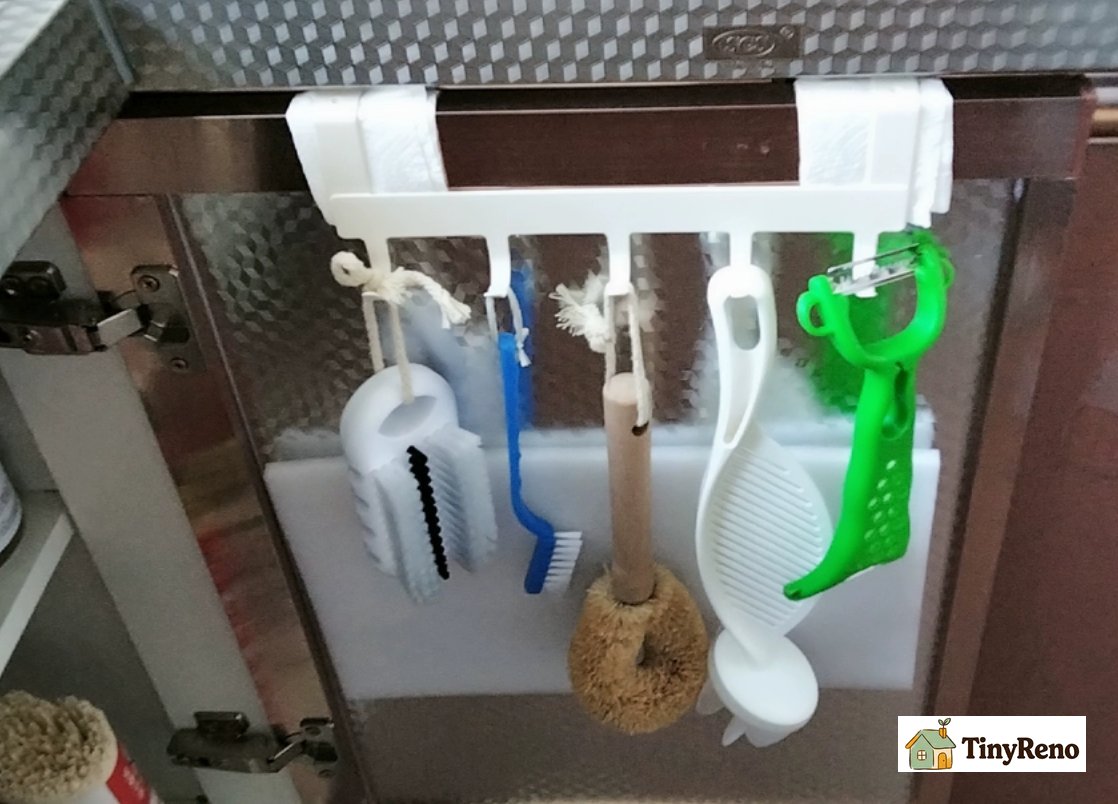 It can also be hung inside the cabinet, making use of this space as well.